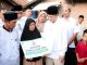Wagub Dimyati saat memberikan bantuan renovasi RTLH untuk lansia.