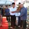 Penjabat (Pj) Gubernur Banten Al Muktabar saat memberikan bantuan untuk masyarakat.