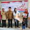 Dewan Muhammad Rizal dan narasumber saat foto bersama masyarakat.