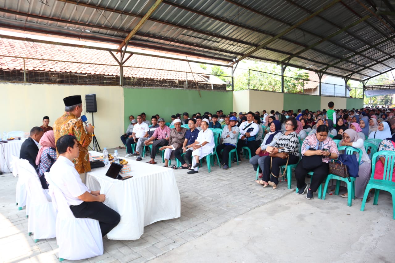 Dewan Muhammad Rizal saat memaparkan materi sosialisasi.