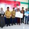 Dewan muhammad Rizal dan narasumber bersama peserta pemenang dorprize.