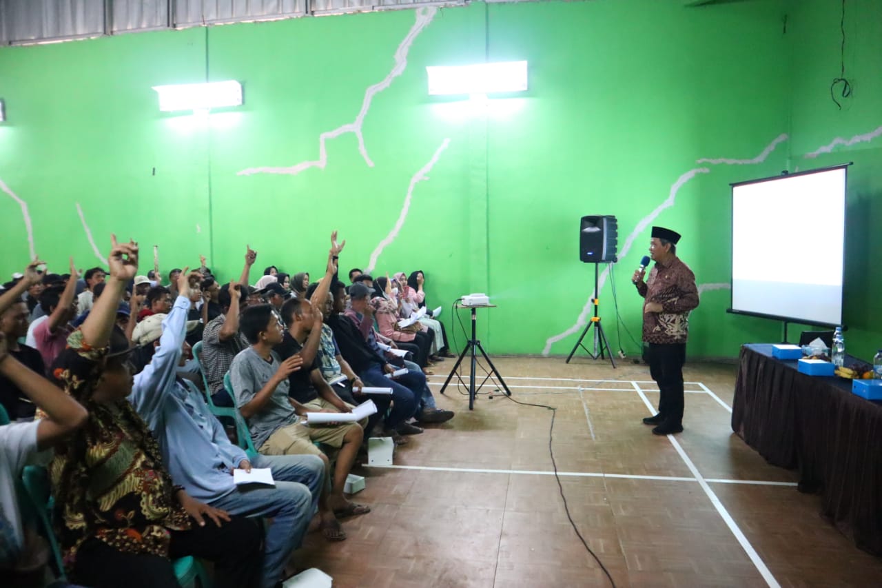 Dewan Muhammad Rizal saat memaparkan materi sosialisasi JKN KIS.