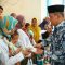 Muhammad Rizal saat memberikan makanan bergizi untuk anak dan ibu hamil dalam upaya pencegahan stunting.