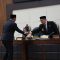 Ketua DPRD Banten Fahmi Hakim saat bersalaman dengan Pj Gubernur Banten A Damenta.