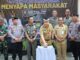 Sekda Soma saat menakan bel simbol peluncuran program satpol pp menyapa masyarakat.