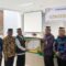 Sekda Soma saat menerima piagam dari Baznas Kabupaten Tangerang.
