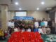 Kajari Dr. Afrillianna Purba dan jajarannya saat bersama anak-anak yatim.