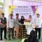 Wabup Intan didampingi Sekdis Dadan saat menyerahkan 10 Rumah Program Bedah RTLH untuk warga Pakulonan Barat, Kelapa Dua.