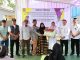 Wabup Intan didampingi Sekdis Dadan saat menyerahkan 10 Rumah Program Bedah RTLH untuk warga Pakulonan Barat, Kelapa Dua.