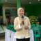 ibu Hj. Ferryka Budiastreani istri H. Rano Alfath saat memberikan sambutannya di kegiatan bazar sembako murah.