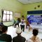 Ketua Sutoto saat menyampaikan sambutannya di acara Refleksi Hari Guru bersama para komunitas Pandeglang di Aula PGRI Kelurahan Cilaja.