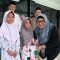 Wabup Intan saat bersama anak yatim.