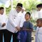 Maryono saat bersama anak yatim.