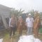Lurah Cipayung, Dini Nurlianti dan Kabid SDA Eka Pribawa saat meninjau lokasi longsor.