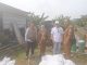 Lurah Cipayung, Dini Nurlianti dan Kabid SDA Eka Pribawa saat meninjau lokasi longsor.