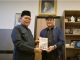 Buku Amirsyah Tambunan membahas sejarah Islam dari era pra-Islam hingga modern, termasuk peradaban Nusantara, ilmu pengetahuan, dan tantangan umat.