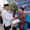 Bazar HUT ke-26 Banten, Sekda Deden Serahkan NIB dan Sertifikat Halal untuk UMKM
